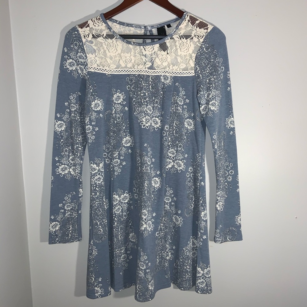 Dusty blue dress with lace shoulders.